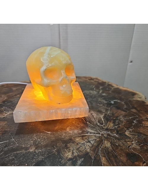 Load image into Gallery viewer, 2.17LB 2Pcs Natural Translucent Calcite Crystal Skull W/satin Spar Base &amp; Led
