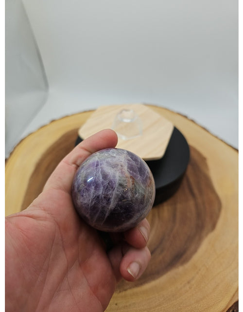 Load image into Gallery viewer, Chevron Amethyst Sphere 250g 56mm
