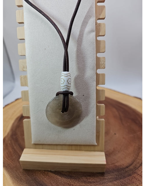 Load image into Gallery viewer, Quartz Lucky Pendant Leather Cord
