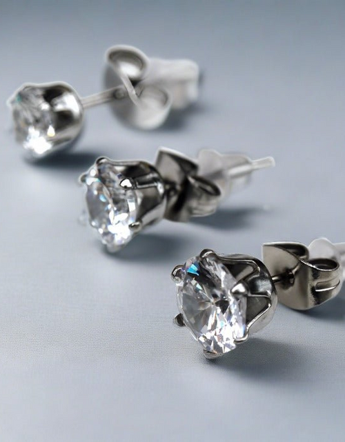 Load image into Gallery viewer, Pair of .925 Sterling Silver Clear Round CZ Stud Earrings
