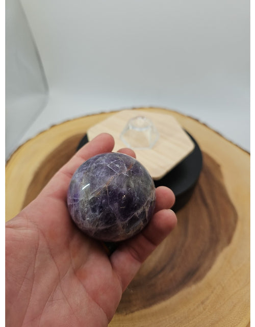 Load image into Gallery viewer, Chevron Amethyst Sphere 250g 56mm
