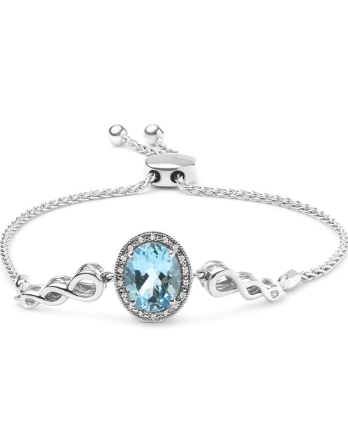 Load image into Gallery viewer, .925 Sterling Silver 10x8mm Oval Blue Topaz and Diamond Accent Lariat 4”-10” Adjustable Bolo Bracelet (H-I Color, SI1-SI2 Clarity)
