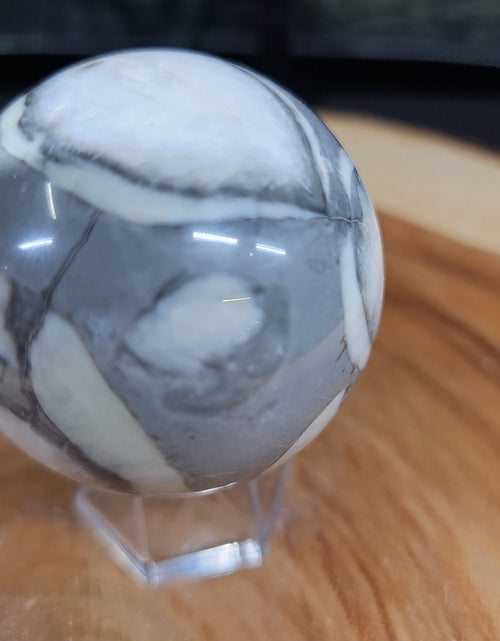 Load image into Gallery viewer, 1000 Eye Ocean jasper quartz sphere

