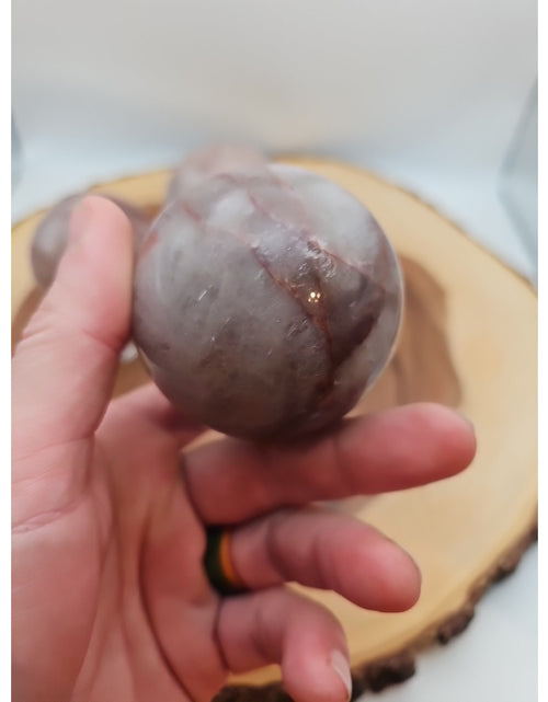 Load image into Gallery viewer, Fire Quartz Crystal Sphere 55-60mm W/stand 1 Each
