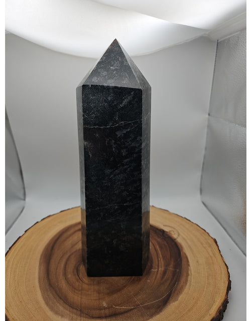 Load image into Gallery viewer, 8.23lb Arfvedsonite Garnet Blue Flashes Crystal Point Tower Polished

