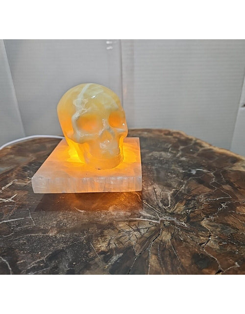 Load image into Gallery viewer, 2.17LB 2Pcs Natural Translucent Calcite Crystal Skull W/satin Spar Base &amp; Led
