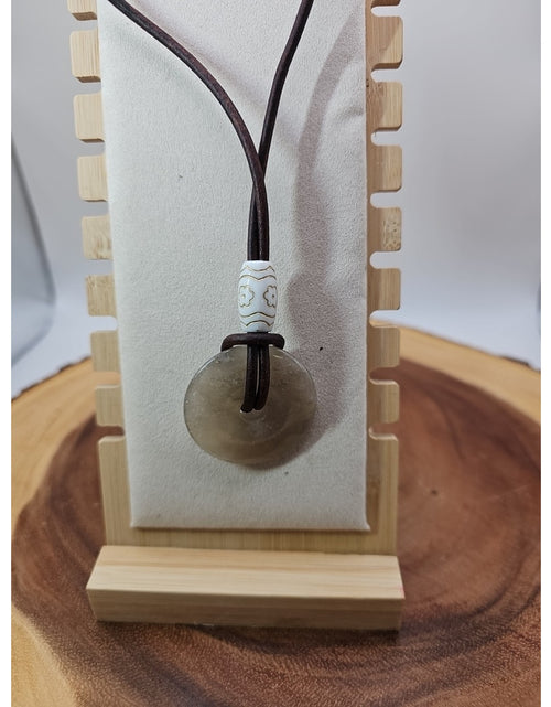 Load image into Gallery viewer, Quartz Lucky Pendant Leather Cord
