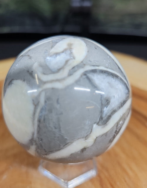 Load image into Gallery viewer, 1000 Eye Ocean jasper quartz sphere
