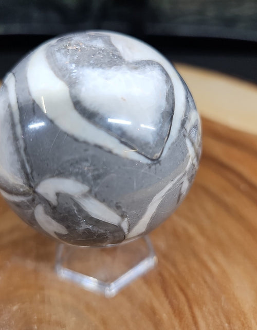 Load image into Gallery viewer, 1000 Eye Ocean jasper quartz sphere
