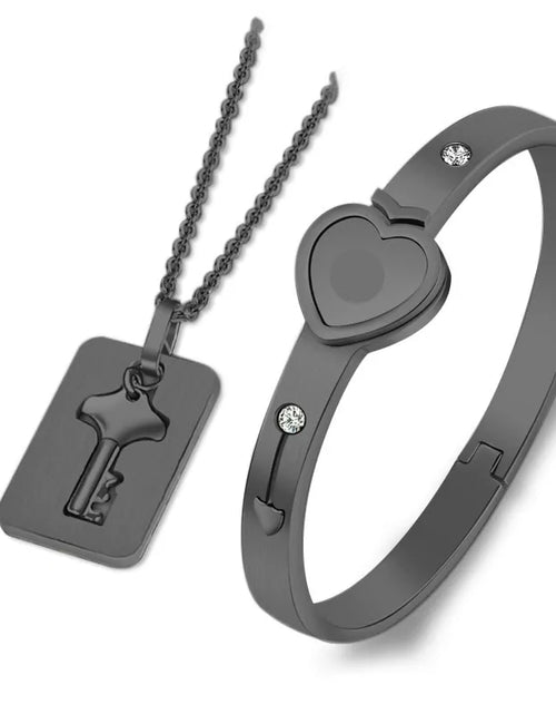 Load image into Gallery viewer, Titanium Steel Concentric Lock Key  Jewelry Set
