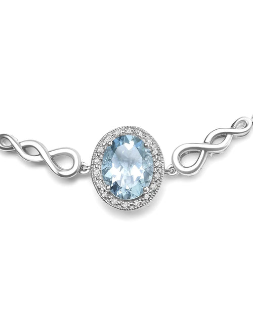 Load image into Gallery viewer, .925 Sterling Silver 10x8mm Oval Blue Topaz and Diamond Accent Lariat 4”-10” Adjustable Bolo Bracelet (H-I Color, SI1-SI2 Clarity)
