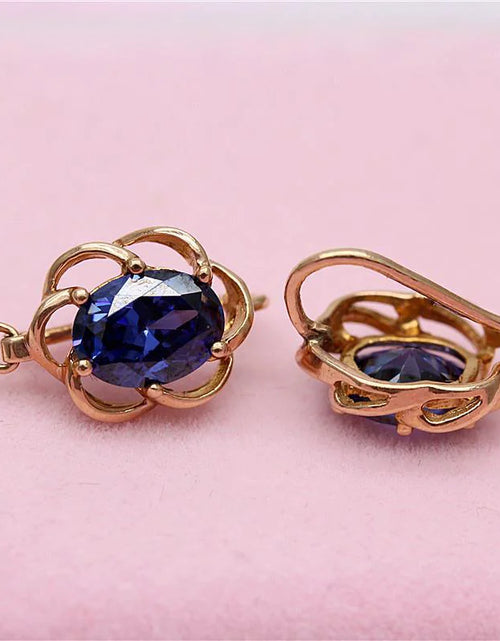 Load image into Gallery viewer, Purple Gold Earrings with Blue Stone
