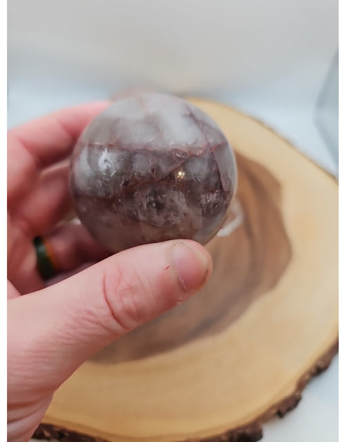 Load image into Gallery viewer, Fire Quartz Crystal Sphere 55-60mm W/stand 1 Each
