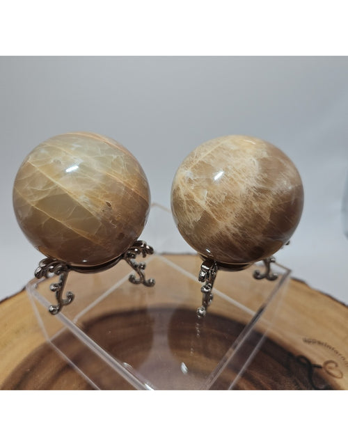 Load image into Gallery viewer, Peach Moonstone Spheres 1 Pair 55mm Each W/Stands
