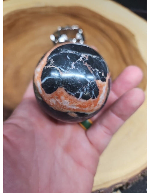 Load image into Gallery viewer, Ocean Jasper Sphere .75lbs 58mm. W/ Elephant Stand
