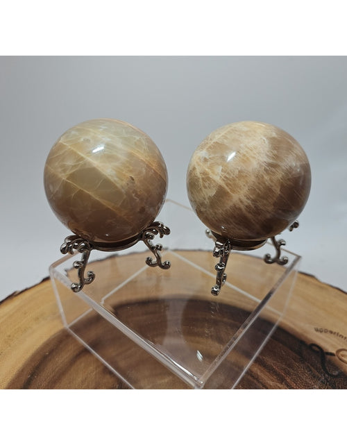 Load image into Gallery viewer, Peach Moonstone Spheres 1 Pair 55mm Each W/Stands

