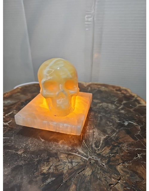 Load image into Gallery viewer, 2.17LB 2Pcs Natural Translucent Calcite Crystal Skull W/satin Spar Base &amp; Led
