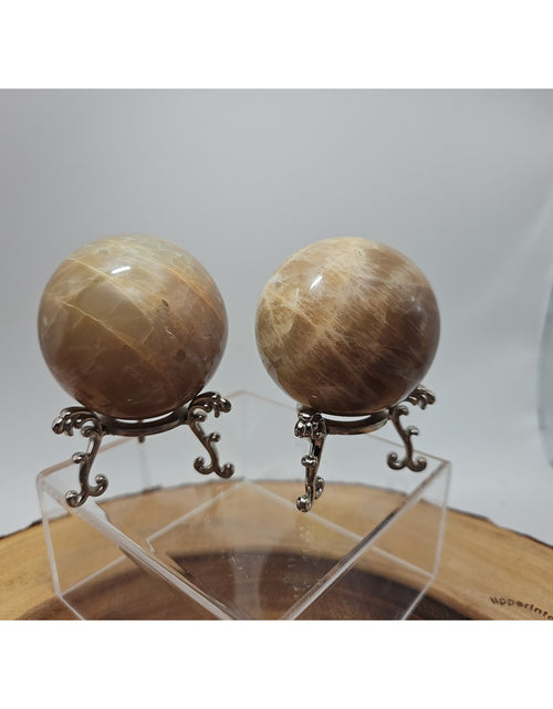 Load image into Gallery viewer, Peach Moonstone Spheres 1 Pair 55mm Each W/Stands
