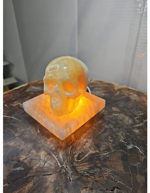 Load image into Gallery viewer, 2.17LB 2Pcs Natural Translucent Calcite Crystal Skull W/satin Spar Base &amp; Led
