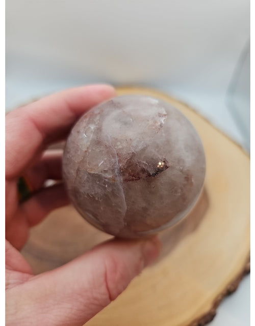 Load image into Gallery viewer, Fire Quartz Crystal Sphere 55-60mm W/stand 1 Each
