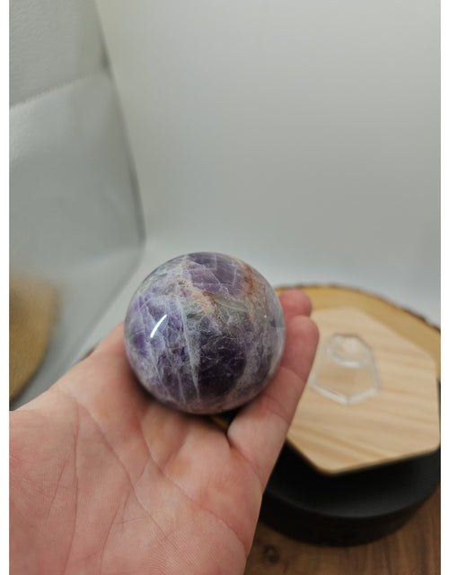 Load image into Gallery viewer, Chevron Amethyst Sphere 250g 56mm
