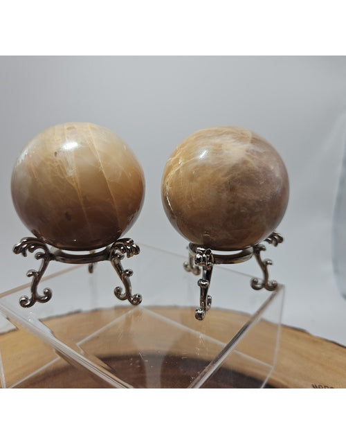 Load image into Gallery viewer, Peach Moonstone Spheres 1 Pair 55mm Each W/Stands
