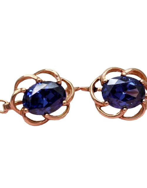 Load image into Gallery viewer, Purple Gold Earrings with Blue Stone
