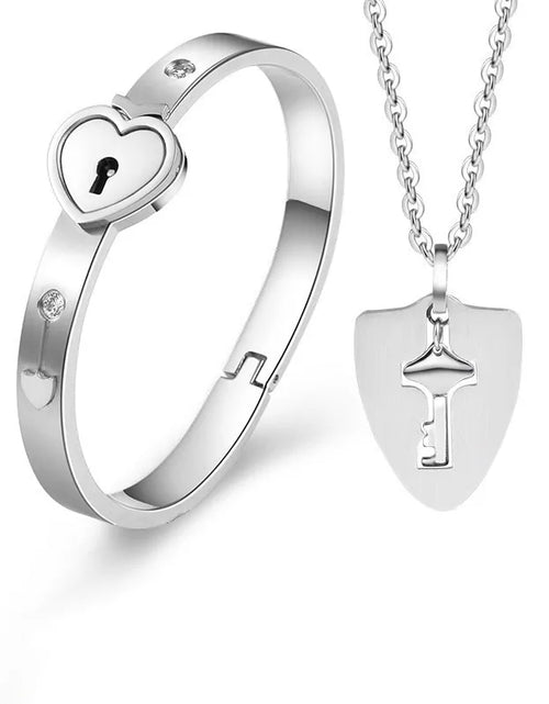 Load image into Gallery viewer, Titanium Steel Concentric Lock Key  Jewelry Set
